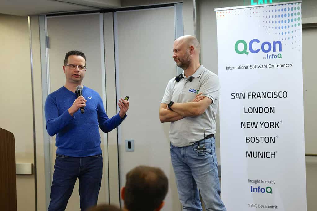 A picture of Eran Stiller and Steef-Jan Wiggers presenting at QCon